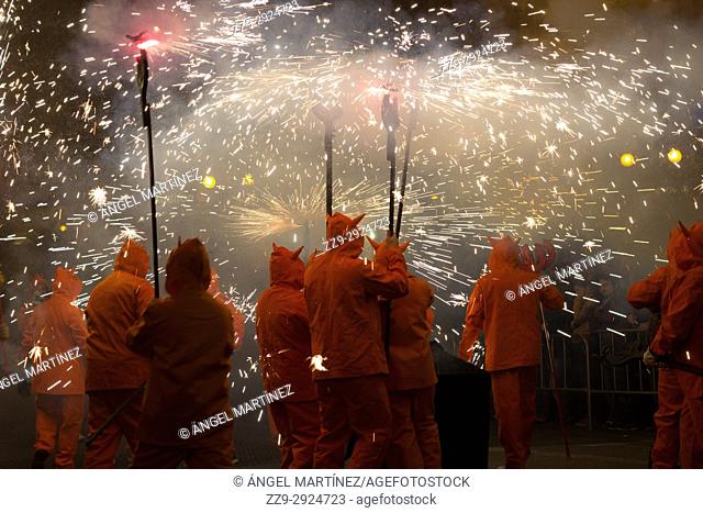 Demons with fireworks during the fallas nights, Valencia, Spain