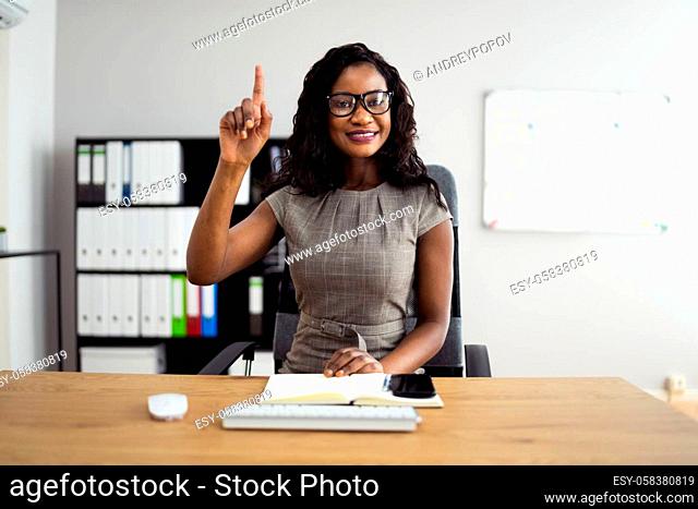 African Woman Raising Hand Asking Question In Online Training Webinar