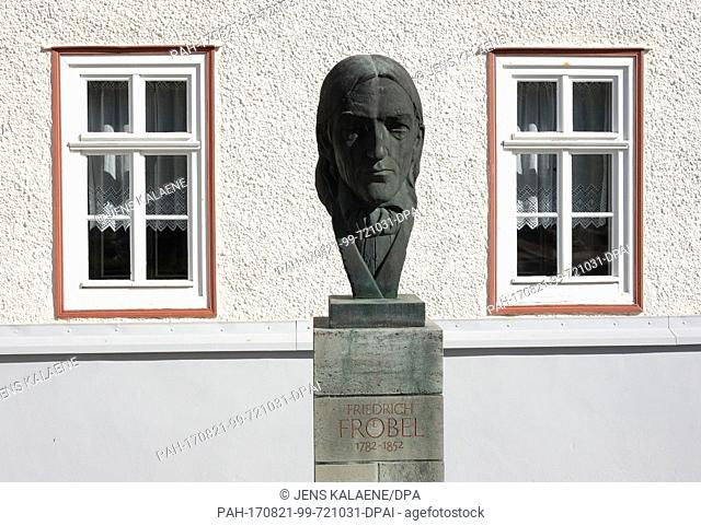 A bust of Friedrich Froebel in front of his birth house in Obeweissbach, Germany, 19 August 2017. The house is now a museum