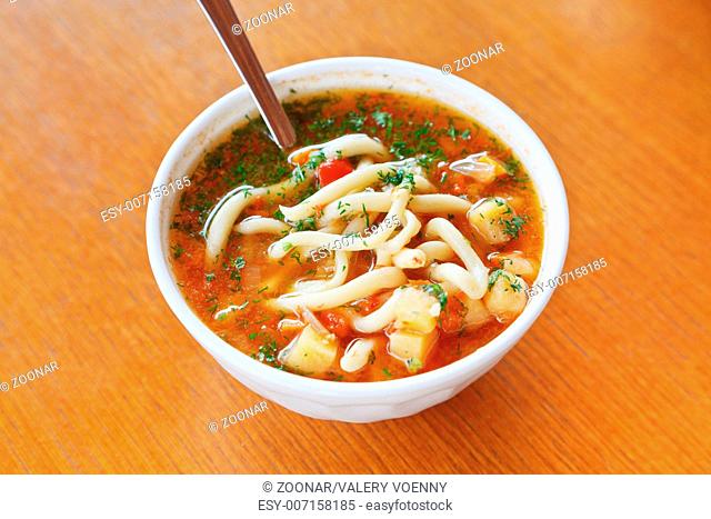laghman soup in white bowl