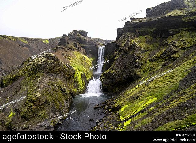 Waterfall, Ragged canyon overgrown with moss, River Skoga, Landscape at Fimmvörðuháls hiking trail, South Iceland, Iceland, Europe