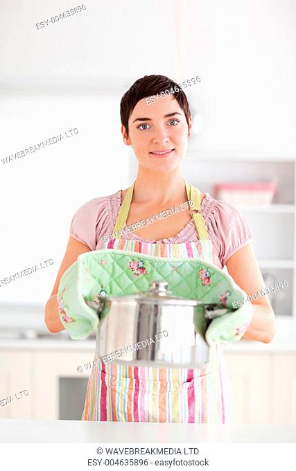 Woman holding a pot