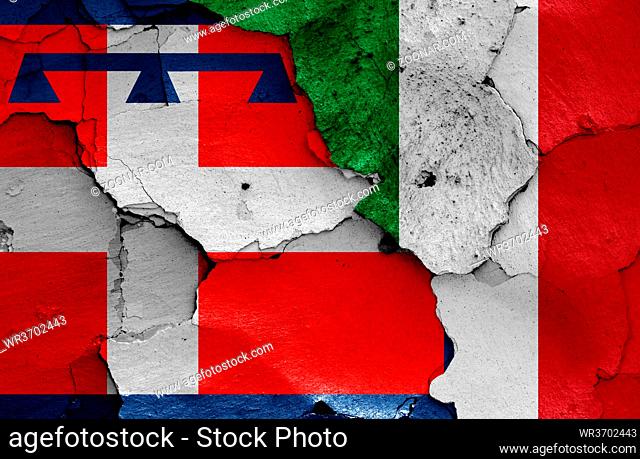 flags of Piedmont and Italy painted on cracked wall