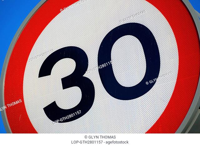England, Warwickshire, Warwick. A 30 miles per hour mph speed restriction sign