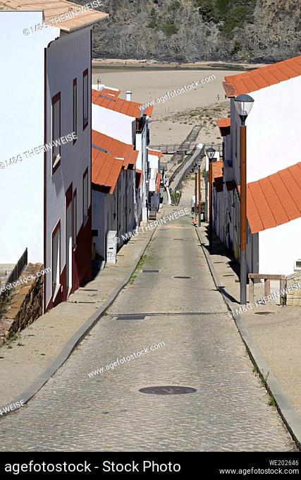 Steep street leading to Odeceixe beach, Aljezur, Faro district, Algarve, Portugal