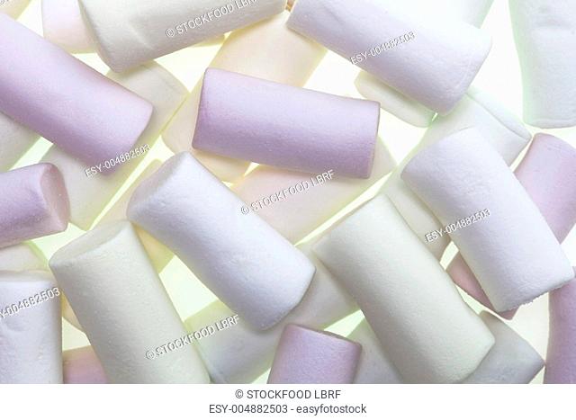 Organic marshmallows coloured with fruit juice seen from above
