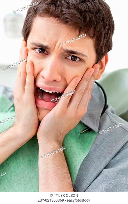 Scared man in Dental Clinic