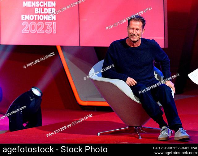 07 December 2023, North Rhine-Westphalia, Hürth: Actor Til Schweiger sits in the RTL annual review ""2023! People, Images, Emotions"" in the studio