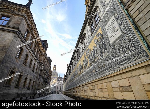 10 July 2023, Saxony, Dresden: Morning view of the Procession of Princes in the Old Town. The 102-meter-long work of art