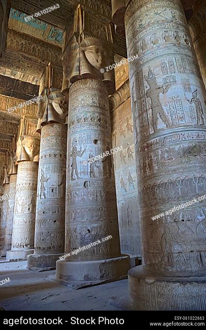 Interior of the painted and carved hypostyle hall at Dendera Temple. Ancient Egyptian temple near Qena