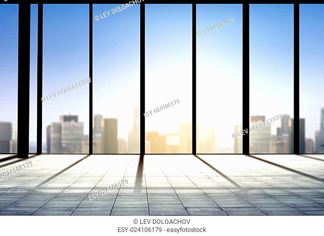 construction, architecture and building concept - empty business office room or airport terminal over city background