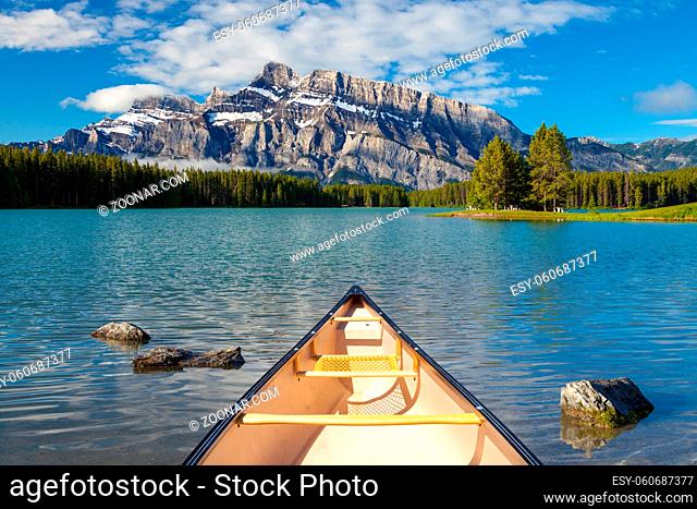 A canoe on the water at Two Jacks Lake in Banff National Park, Alberta, Canada