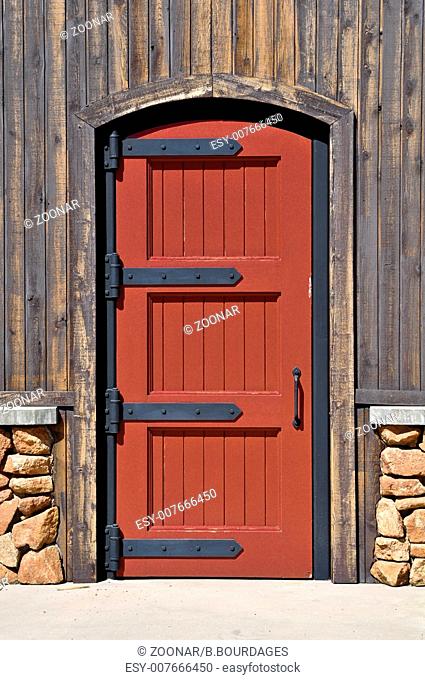 Red Wood Door on Wall of House