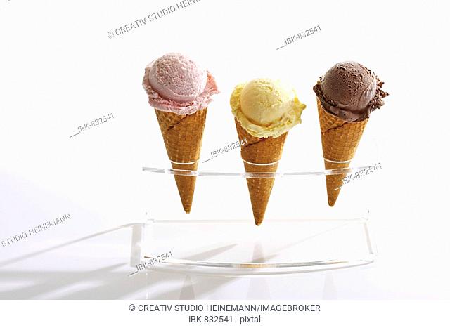 Three ice-cream cones in a stand