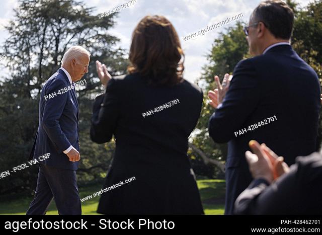 United States President Joe Biden walks off stage during an event to celebrate the Americans with Disabilities Act (ADA) on the South Lawn of the White House in...