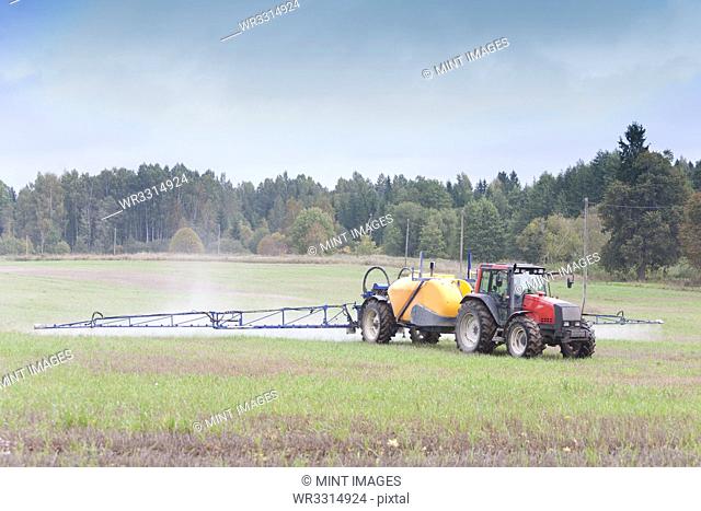 Tractor Spraying Herbicide