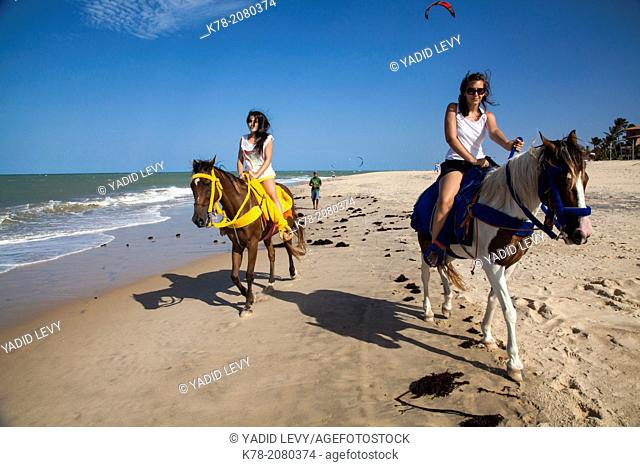 Horse riding on the beach, Cumbuco, Fortaleza district, Brazil