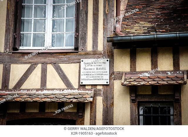 Historic half timbered building in rue d'Enfer in the pretty market town of Lyons la Forêt in Haute Normandie, France  There is a plaque on the wall of the...
