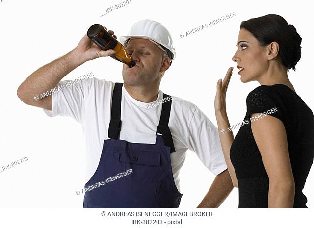 Woman tries to stop a worker from drinking alcohol