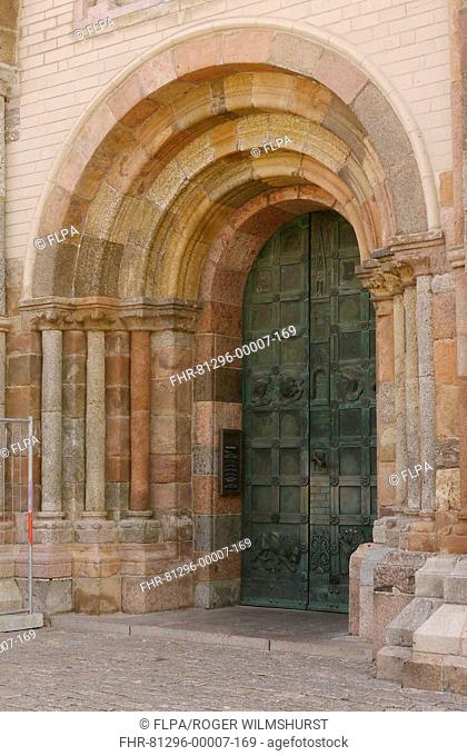 Arched cathedral doorway in historic town, Our Lady Maria Cathedral Vor Frue Maria Domkirke, Ribe, Jutland, Denmark, may