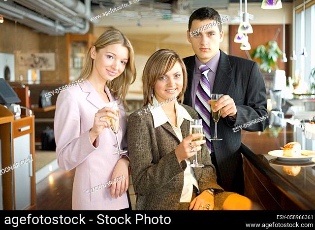 Group of People With Glasses of Champagne. Short Depth of Focus (On Woman's in the Middle Face)