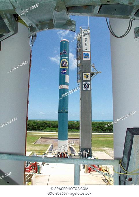 05/29/2002 -- On Launch Pad 17-A, Cape Canaveral Air Force Station, a view of the first stage of a Boeing Delta II rocket is captured between two of the solid...