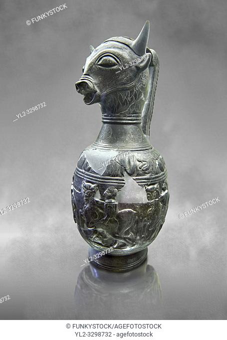 Three quarters view of the 6th century BC Etruscan Bull headed bucherro style oinochoe, or wine jug, made in Chuisi and excavated from the necropolis de Fonte...