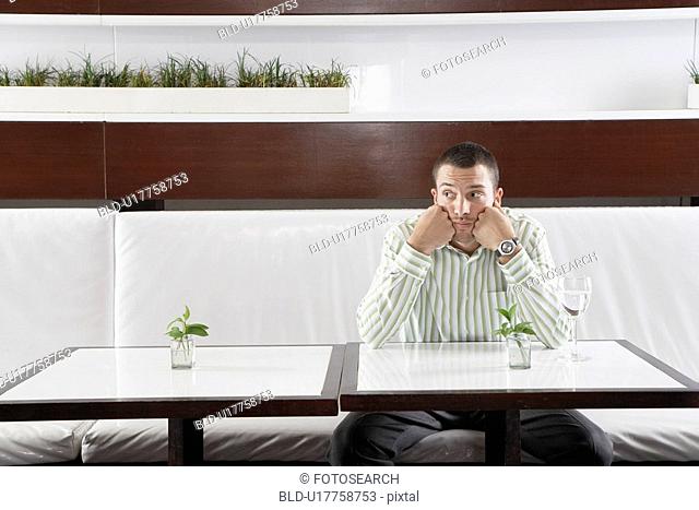 Businessman waiting in restaurant