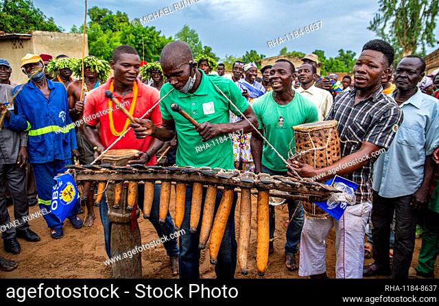 Men playing traditional instruments at a tribal festival, Southern Chad, Africa