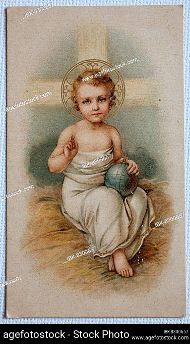 Holy picture, communion picture, baby Jesus with a globe crowned by a cross, Germany, 1910, Historic, digitally restored reproduction of an original 19th...