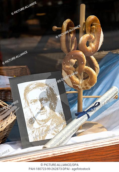 20 July 2018, Germany, Bayreuth: Richard-Wagner-themed knickknack is on display in a shop window in the inner city. This year's Bayreuth Festival is due to...