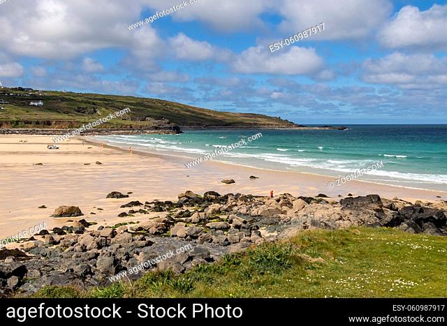 ST IVES, CORNWALL, UK - MAY 13 : View of Porthmeor beach at St Ives, Cornwall on May 13, 2021. One unidentified person