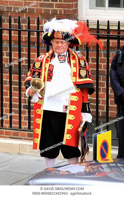 The town crier announces the birth of the new royal baby outside St. Mary's Hospital. Catherine, The Duchess of Cambridge and Prince William are new parents...