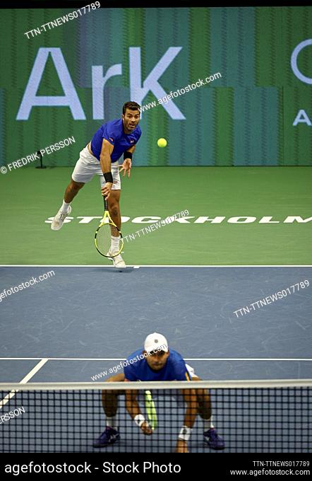 Jean-Julien Rojer (top) of the Netherlands and Marcelo Arévalo of El Salvador in action against Andrés Molteni of Argentina and Santiago González of Mexiko...