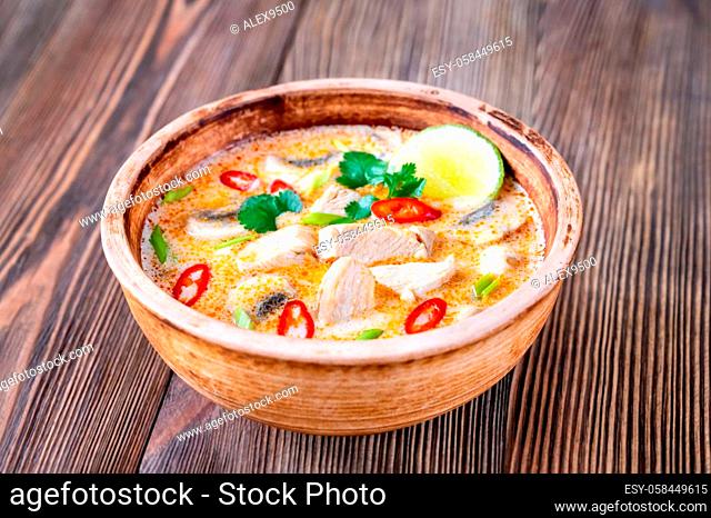 Bowl of Tom kha kai - Thai chicken coconut soup