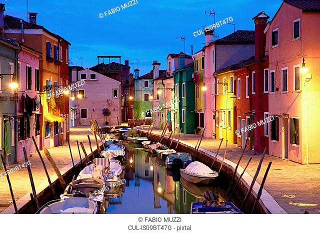 Traditional multicoloured houses on waterfront at dusk, Burano, Venice, Veneto, Italy