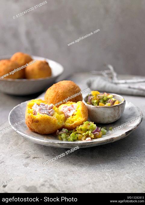 Fried Sicilian rice dumplings with a ricotta and ham filling