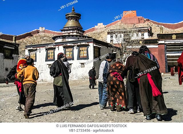 Tibetan pilgrims at Pelkor Chode Monastery, Gyantse, Tibet