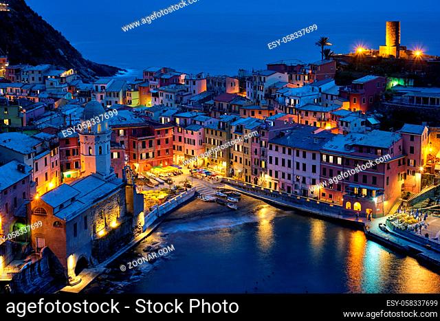 Vernazza village popular tourist destination in Cinque Terre National Park a UNESCO World Heritage Site, Liguria, Italy view illuminated in the night from Azure...