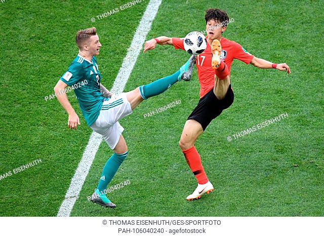 Marco Reus (Germany, l.) Versus Jaesung Lee (South Korea, r.). GES / Soccer / World Cup 2018 Russia: South Korea - Germany, 27.06