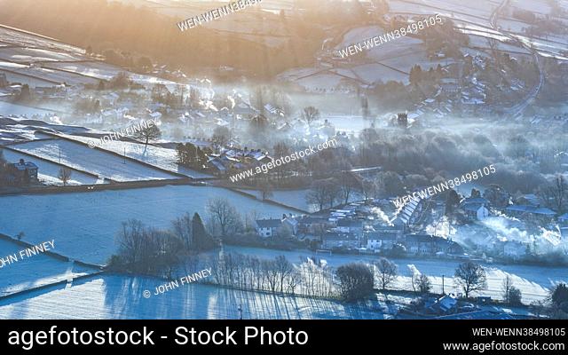 A frosty start at sunrise over the small Derbyshire village of Hayfield in the Peak District National park, Derbyshire, United Kingdom Featuring: Atmosphere...