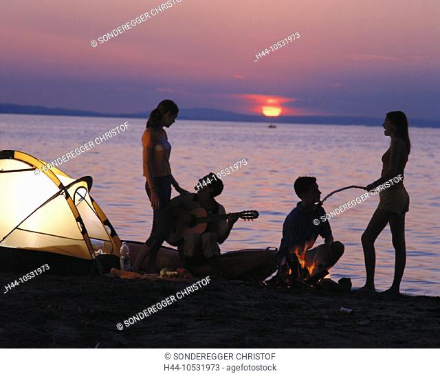 10531973, youngsters, tents, camping, campinging, camp, warehouse, food, guitar, campfire, lake, sea, lake shore, sundown, tee