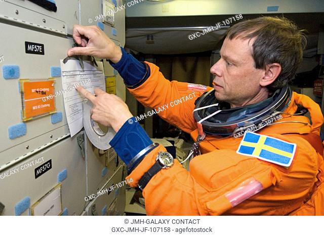 European Space Agency (ESA) astronaut Christer Fuglesang, STS-116 mission specialist, attired in his training version of the shuttle launch and entry suit