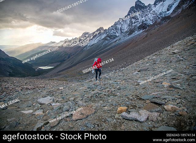 Hiker in Patagonia region of South America at sunrise