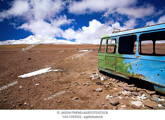 Bolivia, Southern Altiplano, Portezuelo del Cajon  Abandonded bus shell rustin near the Chilean Border