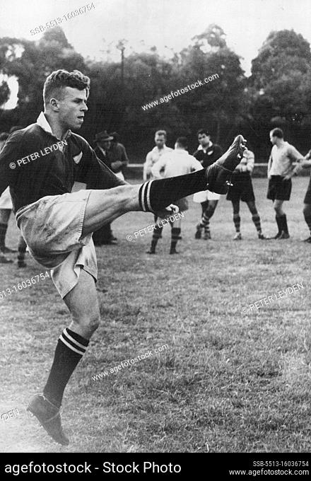 J. Solomon, Captain of the State Union Team punting during practice at University Oval. April 27, 1953. (Photo by Peter Leyden)