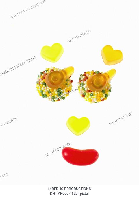 Assorted Sweets placed to make a face