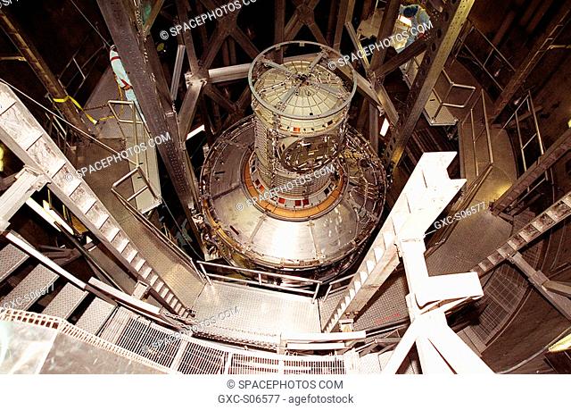 09/19/2000 --- The Joint Airlock Module is fully lowered into the vacuum chamber inside the Operations and Checkout Building