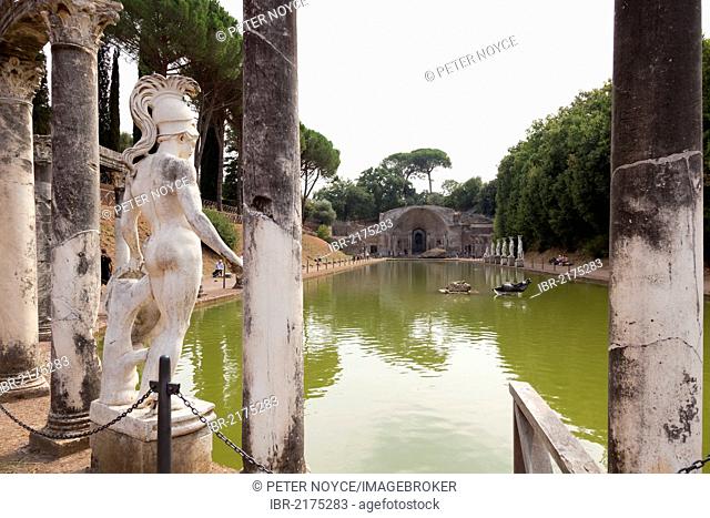 Ares or Hermes statue and pillars of the colonnade overlooking the Canopus at Hadrian's Villa, Villa Adriana, Tivoli, Italy, Europe