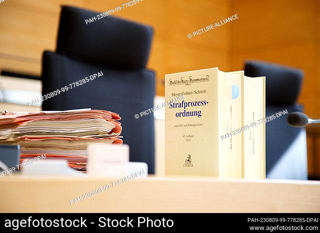 09 August 2023, North Rhine-Westphalia, Bielefeld: View of a copy of the Code of Criminal Procedure. This marks the start of a trial for manslaughter among...
